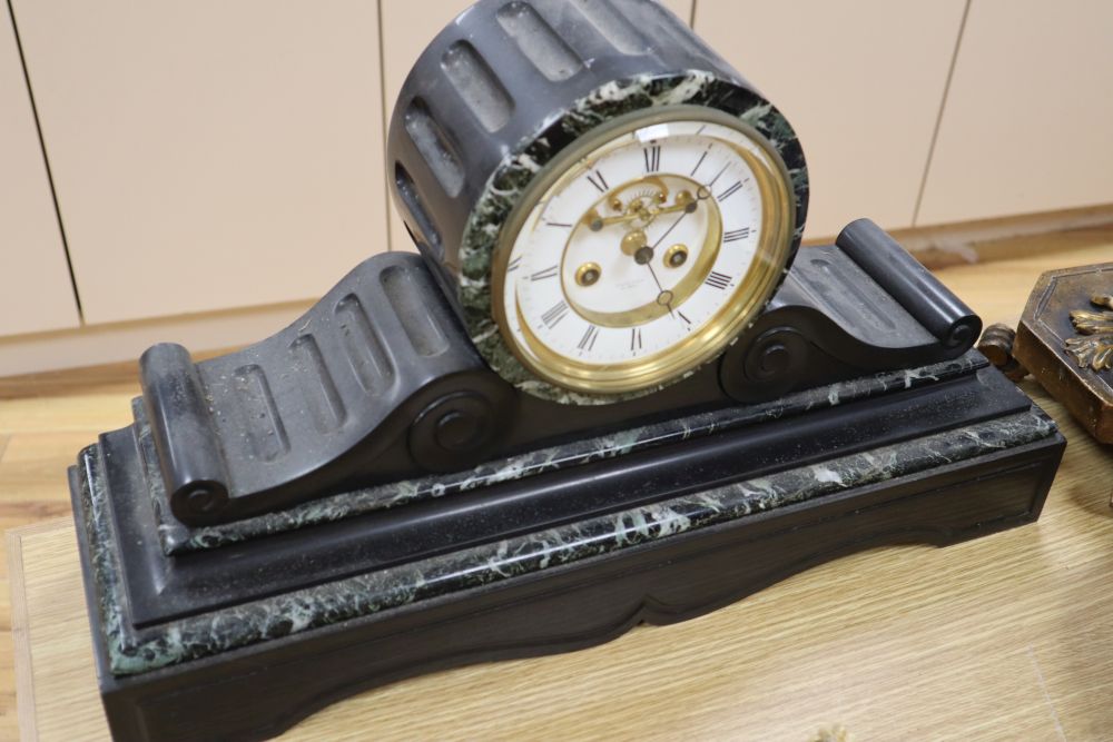 A large Victorian black slate mantel clock, with French bell-striking movement, 56cm wide